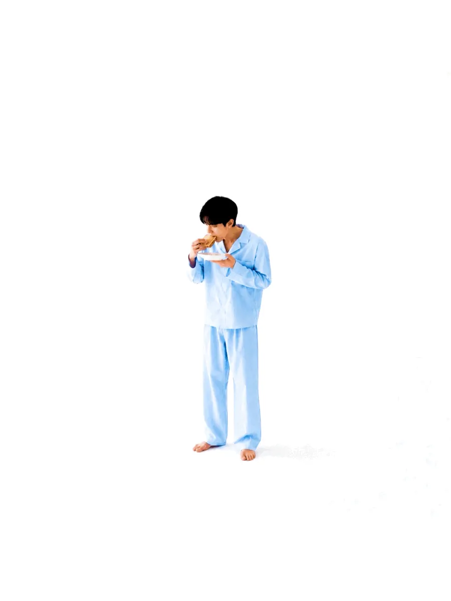 QUIET HOUR — 흰 공간에서 식사하는 연한 하늘색 파자마 차림의 인물